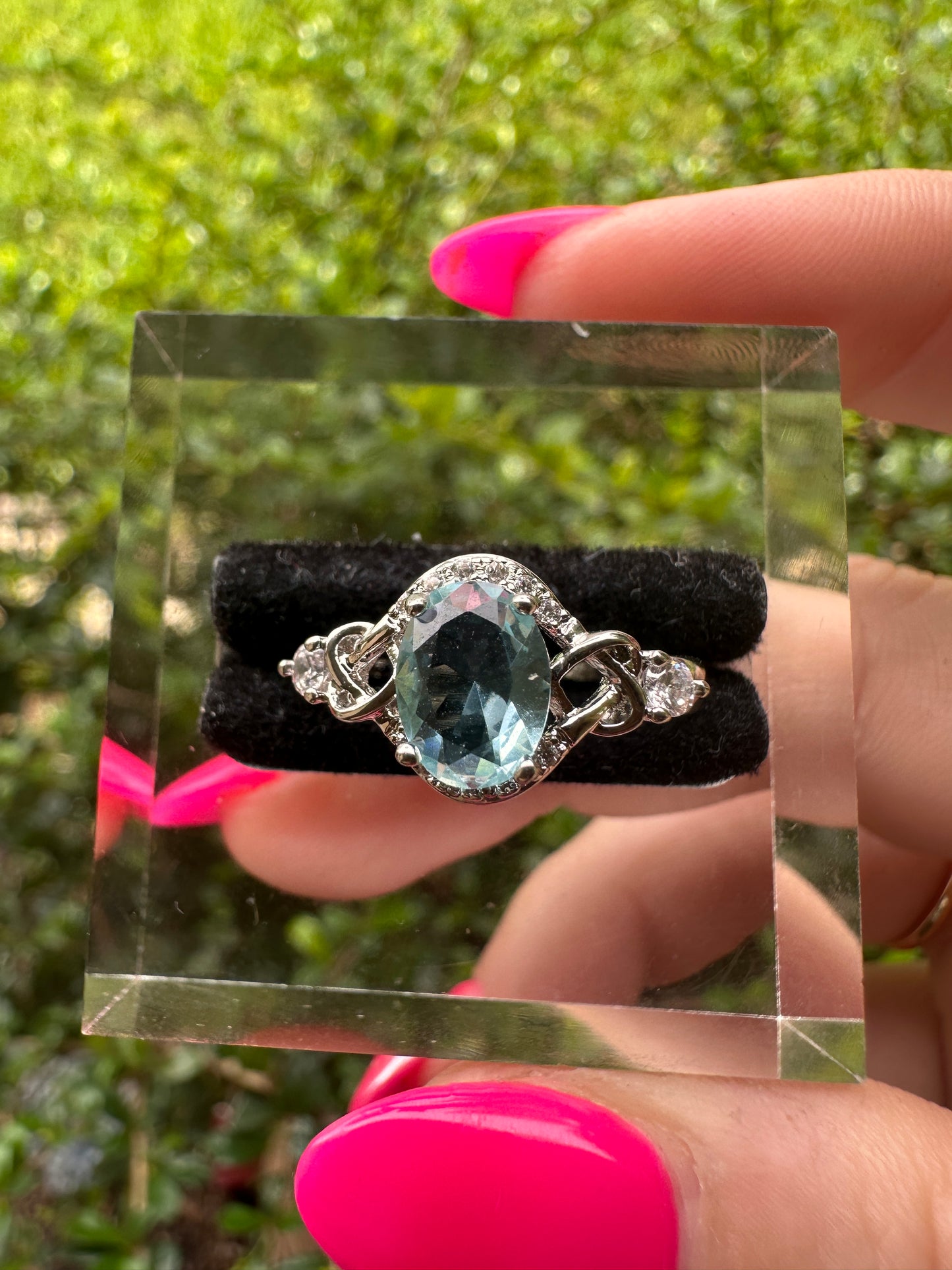 Aquamarine Oval Halo Ring in Silver
