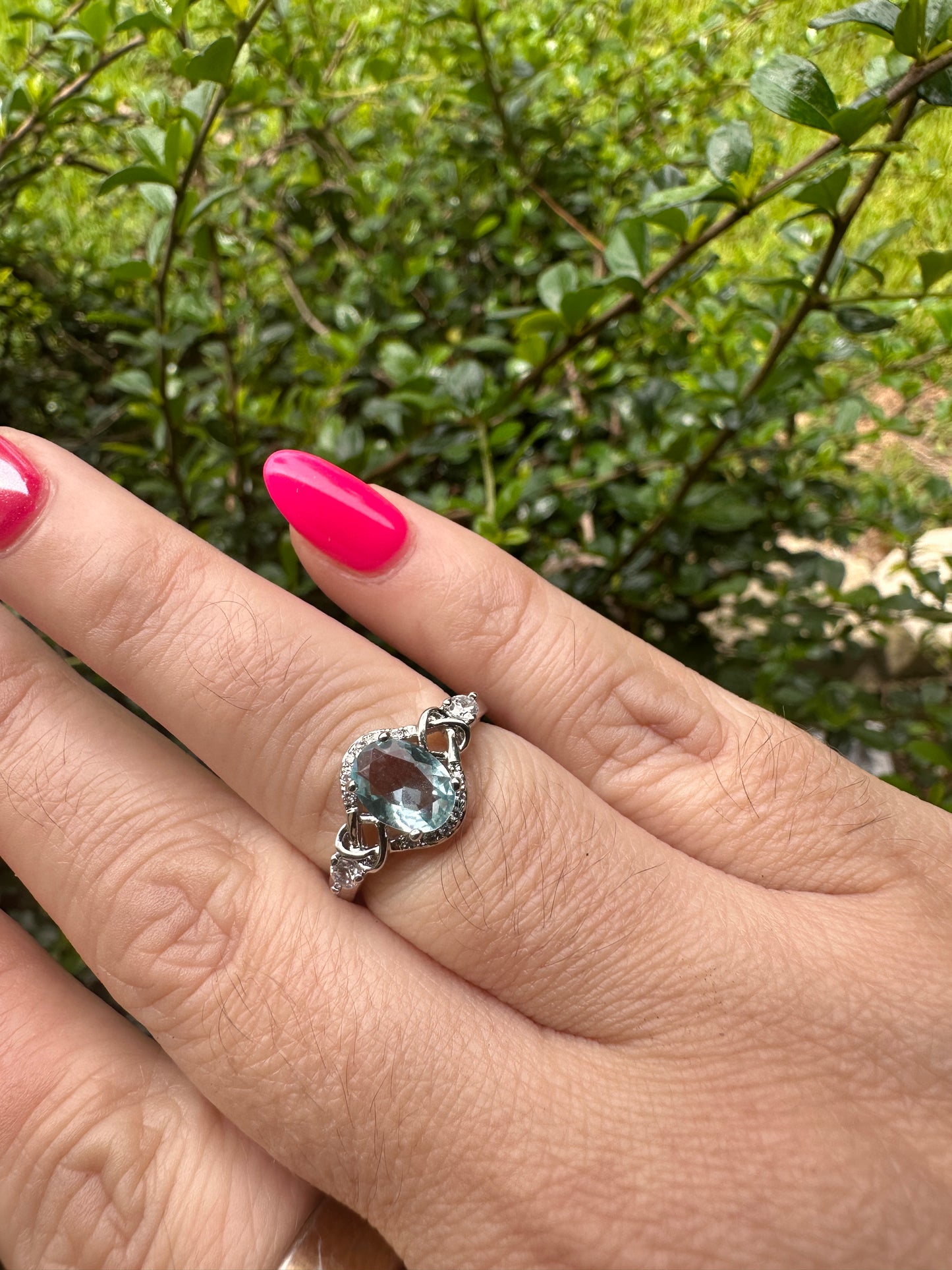 Aquamarine Oval Halo Ring in Silver